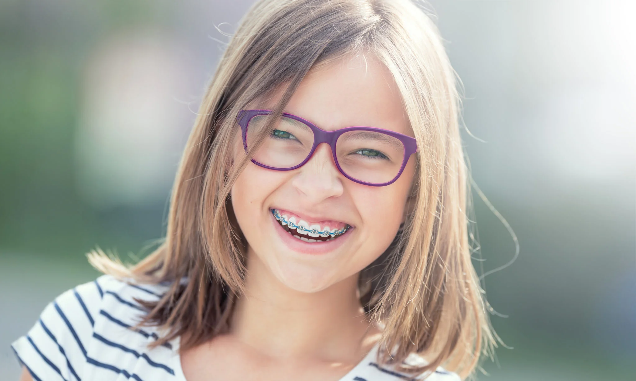 Gentle dentist caring for a patient at Painless Dentistry